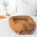 babynest-leinen-gelb-camel-nestchen-kokon